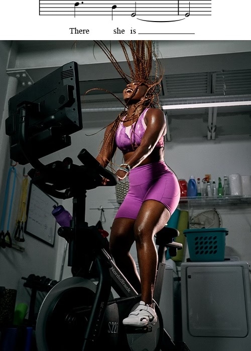 Woman on exercise bike. 
