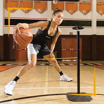 Image of Athlete Dribbling Basketball