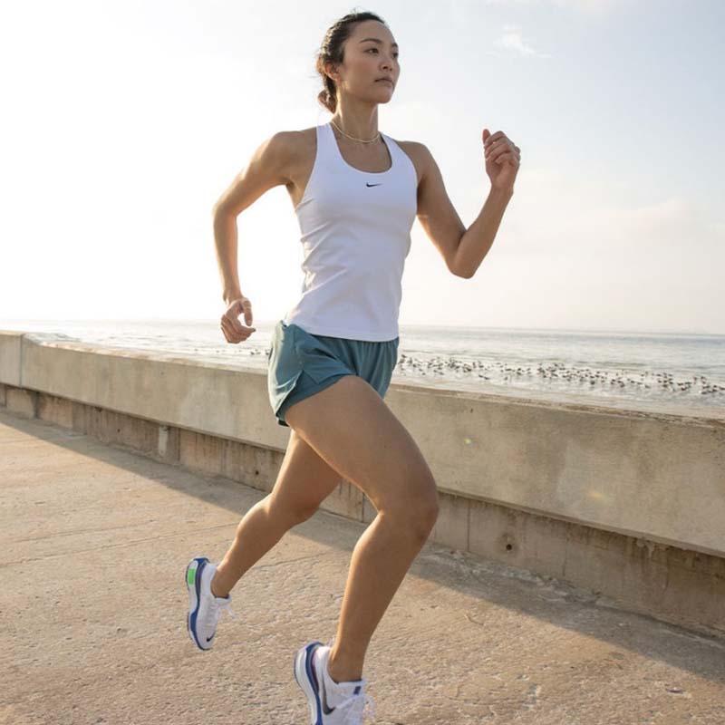 woman running near beach