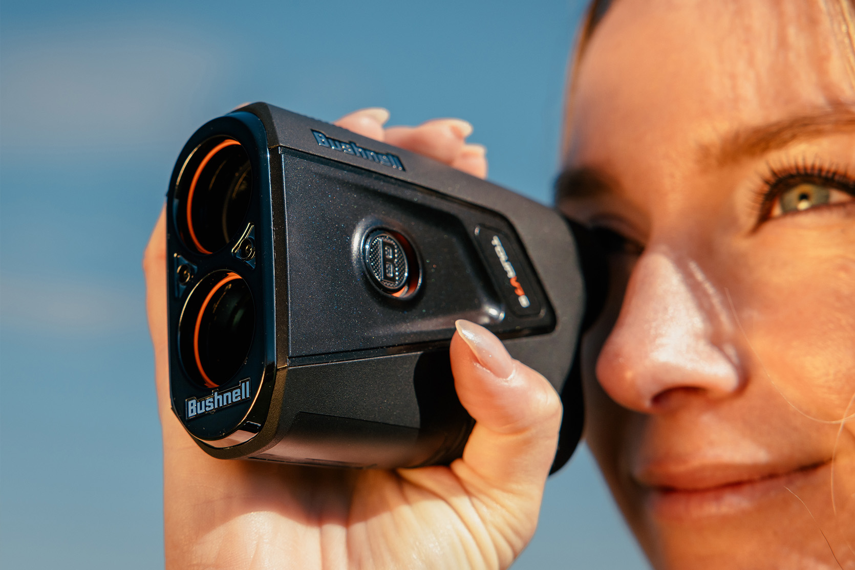 Golfer using a Bushnell Rangefinder
