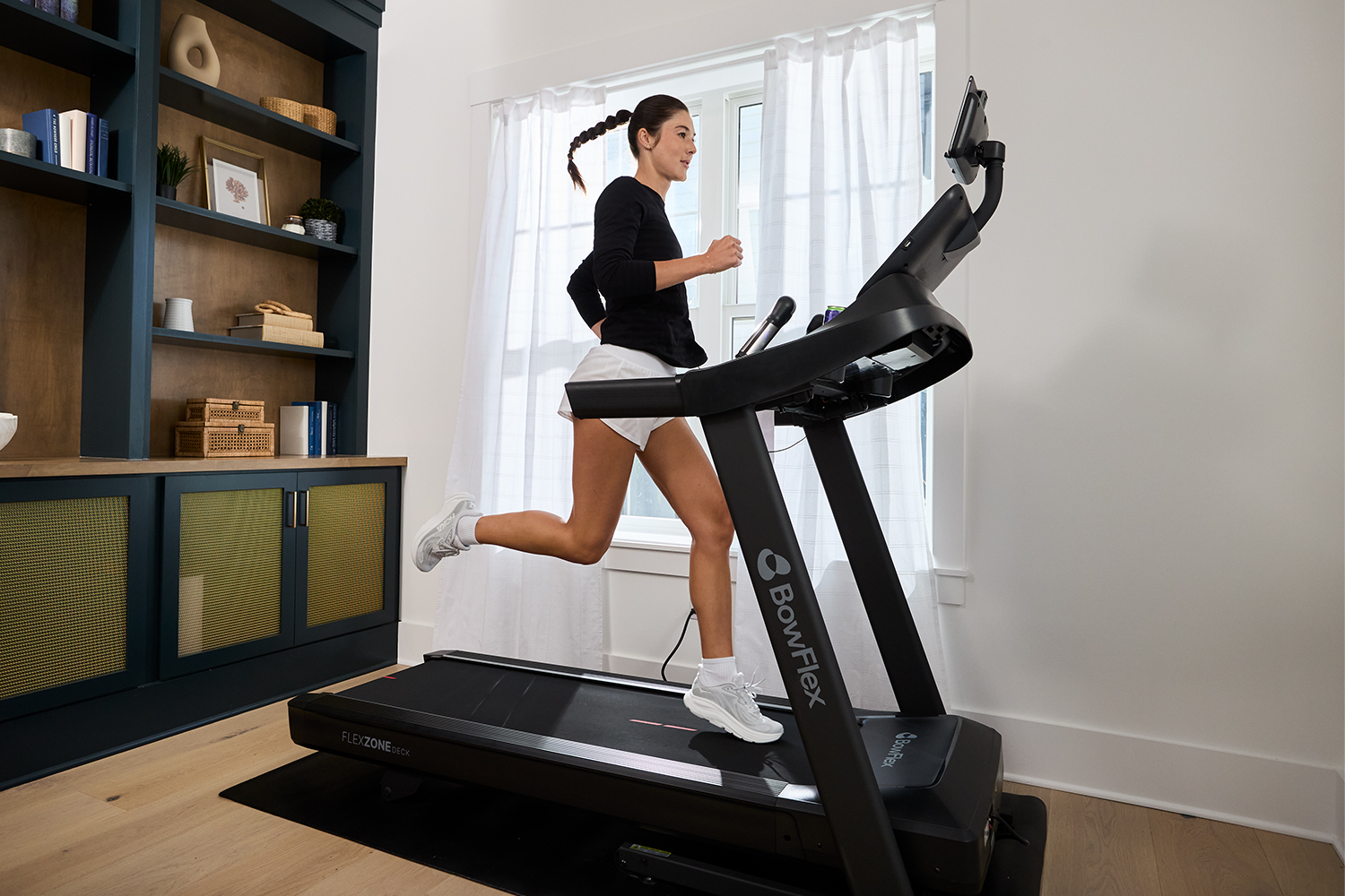 Woman on treadmill.