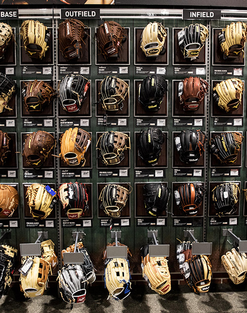 wall of baseball gloves