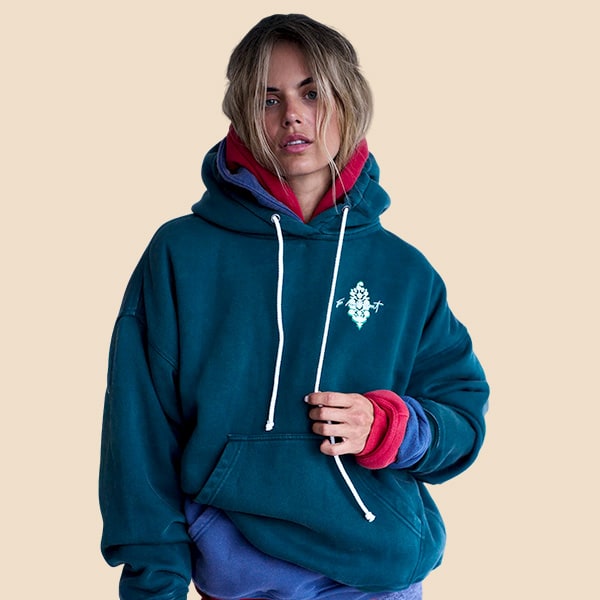 Woman in FP movement hoodie.