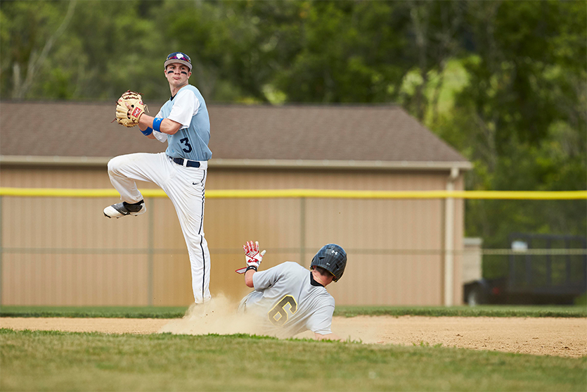 Baseball players on the field. 
