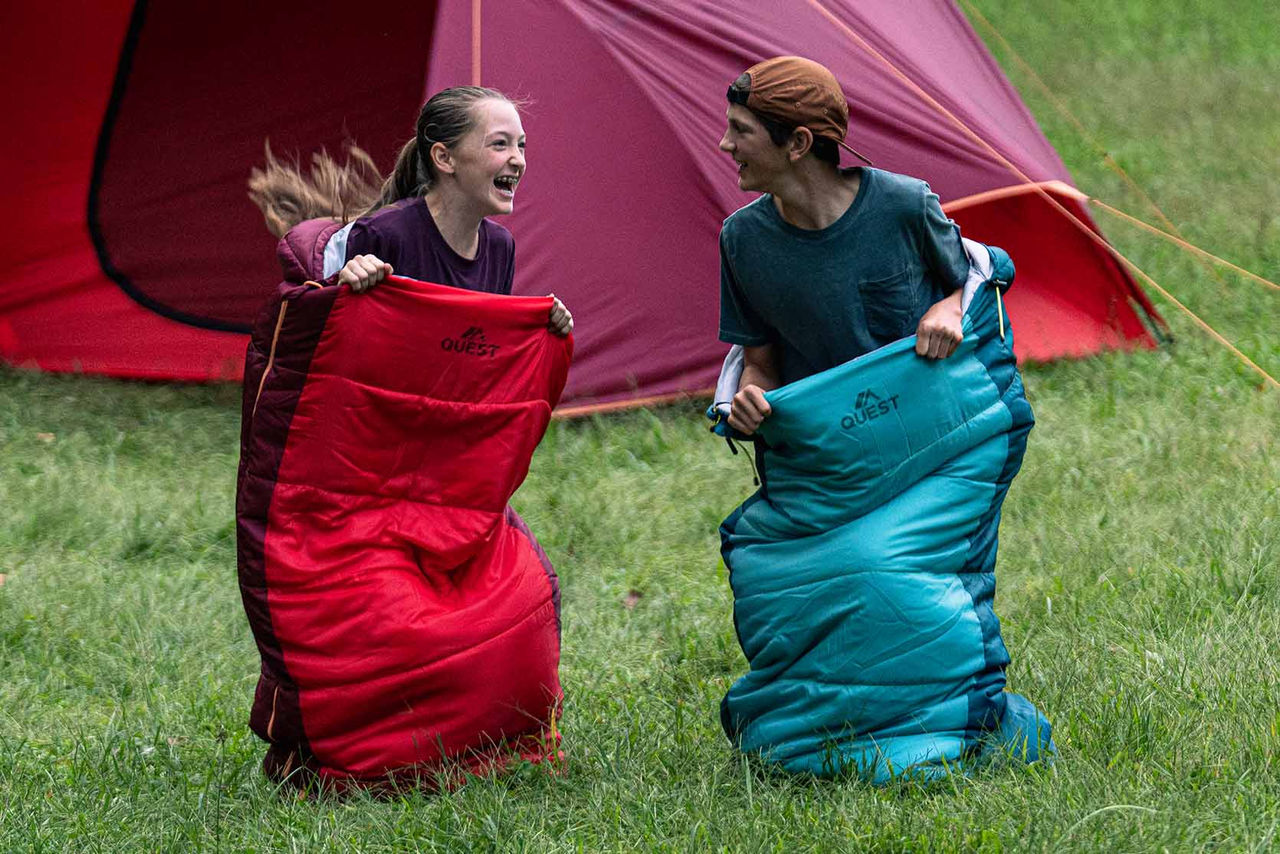 kids in sleeping bags laughing