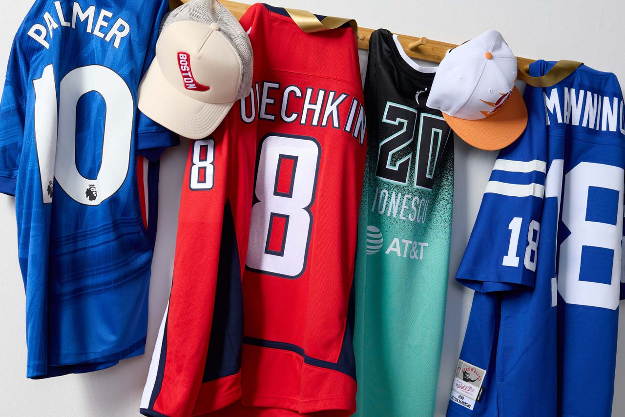 Jerseys hanging on pole