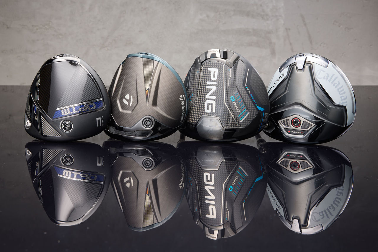 golf drivers on table