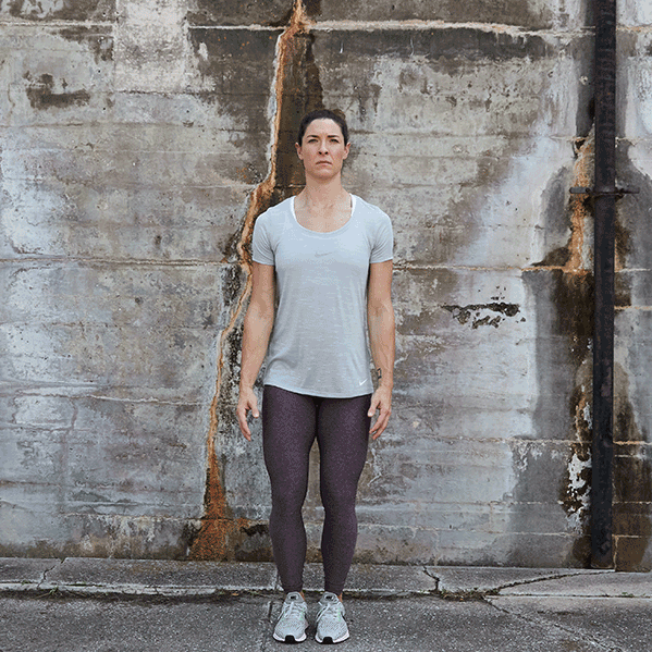 Female doing jumping jacks. 