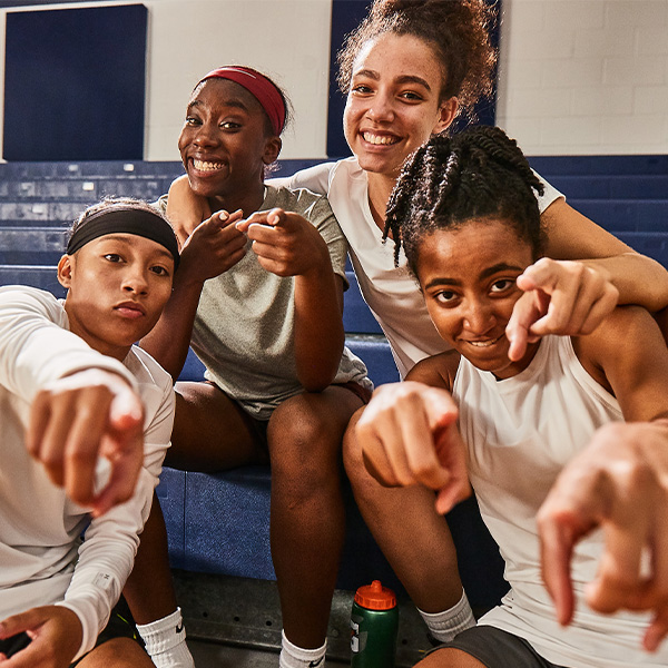 Females pointing at the camera.